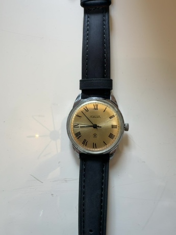 Raketa vintage manual gold dial watch